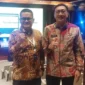 Bupati Pessel, Hendrajoni (kiri) bersama Kadis Kominfo Pessel, Wendi saat menghadiri Digital Trust360 Summit di Jakarta. (Foto: Dok. Kominfo)
