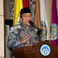Wakil Wali Kota Padang, Maigus Nasir memberikan sambutan pada Raker Forum MWA PTNBH Indonesia 2025 di Auditorium UNP, Jumat (7/11/2025). (Foto: Prokopim Padang)