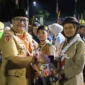 Sekda Padang Andree Algamar menutup Raimuna Daerah (Raida) VII Sumbar di Bumi Perkemahan Kwarcab Padang, Balai Gadang, Kecamatan Koto Tangah, Jumat (21/11/2025). (Foto: Prokopim Padang)