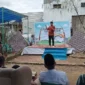 Camat Lubeg Nofiandi Amir membuka Festival Permainan Tradisional Anak di Kampung Seni Palapa, Kelurahan Palapa Nan XX, Kamis (25/12/2025). (Foto: Diskominfo Padang)