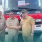Wali Kota Padang Panjang, Hendri Arnis menerima hibah armada damkar dari Gubernur DKI Jakarta, Pramono Anung di Pelataran Monas, Jakarta, Senin (29/12/2025). (Foto: Kominfo Padang Panjang)