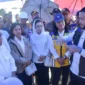 Wali Kota Padang, Fadly Amran mendampingi kunjungan kerja Wakil Ketua Komisi V DPR RI, Ridwan Bae bersama sejumlah kementerian terkait meninjau kondisi Sungai Batang Kuranji di Jembatan Kuranji, Jalan Raya Bypass, Rabu (10/12/2025). (Foto: Prokopim Padang)