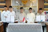Penandatanganan PKS penerbangan haji bersama PT Garuda Indonesia di Gedung Kemenhaj Jakarta, Rabu (17/12/2025). (Foto: Kemenhaj)