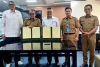 Pemko Padang dan Unand menandatangani kerjasama tentang Kajian Dampak Bencana Terhadap Infrastruktur di Kota Padang. (Foto: Diskominfo Padang)