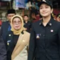 Bupati Dharmasraya Annisa Suci Ramadhani bertindak sebagai inspektur upacara peringatan HUT ke-22 Kabupaten Dharmasraya di Lapangan Sepak Bola Matador Seberang Piruko, Nagari Koto Baru, Selasa (6/1/2026). (Foto: Pemkab Dharmasraya)