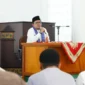 Bupati Tanah Datar Eka Putra menyampaikan sambutan saat peringatan Isra Mi’raj Nabi Muhammad SAW 1447 H di Masjid Nurul Amin, Pagaruyung, Jumat (23/1/2026). (Foto: Prokopim Tanah Datar)