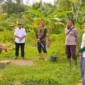 Tim BKSDA Resor Pessel bersama personel kepolisian dan masyarakat meninjau lokasi sapi yang diterkam harimau di Nagari Lubuk Betung, Kecamatan Airpura. (Foto: Dok. BKSDA)