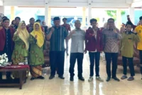 Asisten I Bidang Pemerintahan dan Kesra Setdako Padang, Tarmizi Ismail saat menghadiri pelantikan PC IMM Padang periode 2026–2027, Sabtu (24/1). (Foto: Diskominfo Padang)