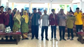 Asisten I Bidang Pemerintahan dan Kesra Setdako Padang, Tarmizi Ismail saat menghadiri pelantikan PC IMM Padang periode 2026–2027, Sabtu (24/1). (Foto: Diskominfo Padang)