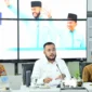 Wali Kota Padang Fadly Amran saat Rakor bersama Deputi Bidang Pengendalian Perubahan Iklim dan Tata Kelola Nilai Ekonomi Karbon KLH RI, Ary Sudijanto secara daring dari Gedung Putih Kediaman Resmi Wali Kota Padang, Senin (12/1/2026). (Foto: Prokopim Padang)