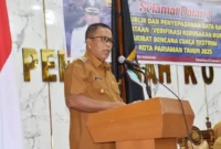 Wakil Wali Kota Pariaman Mulyadi membuka uji publik dan penyepadanan data kerusakan rumah akibat bencana cuaca ekstrem di Kota Pariaman Tahun 2025, Senin (26/1/2026). (Foto: Kominfo Kota Pariaman)