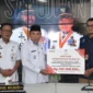 Wakil Wali Kota Padang Maigus Nasir menerima bantuan dari Kemensos RI untuk disalurkan kepada ahli waris korban bencana hidrometeorologi di Gedung Putih Rumah Dinas Wali Kota Padang, Rabu (25/2/2026). (Foto: Prokopim Padang)
