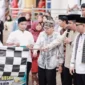 Wali Kota Solok, Dr. Ramadhani Kirana Putra melepas Pawai Khatam Al-Qur’an ke-8 di Masjid Al Aqsa Gawan, Kelurahan Tanah Garam, Minggu (1/2/2025). (Foto: Prokopim Solok)