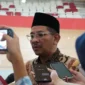 Direktur Jenderal Bimas Islam Kemenag RI, Abu Rokhmad didampingi Direktur Pemberdayaan Zakat dan Wakaf Kemenag, Waryono Abdul Ghafur memberikan keterangan pers, Kamis (12/3/2026). (Foto: Kemenag)