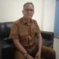Kepala Dinas Perpustakaan dan Kearsipan Kabupaten Pesisir Selatan, Adril Yesmen. (Foto: Dok. Niks)