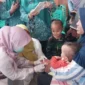 Dinkes Padang mengimbau orangtua agar segera membawa anak usia 9–59 bulan ke posyandu atau puskesmas untuk imunisasi. (Foto: Diskominfo Padang)
