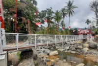 Jembatan Gantung Merah Putih di Kampung Guo, RT 01/RW 06, Kelurahan Kuranji, Kota Padang diresmikan, Senin (9/3/2026). (Foto: Diskominfo Padang)