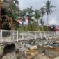 Jembatan Gantung Merah Putih di Kampung Guo, RT 01/RW 06, Kelurahan Kuranji, Kota Padang diresmikan, Senin (9/3/2026). (Foto: Diskominfo Padang)