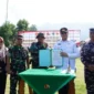 Penandatanganan naskah hasil program TMMD dan penyerahan hasil pelaksanaan kegiatan dari pihak TNI kepada Pemkab Tanah Datar. (Foto: Prokopim Tanah Datar)