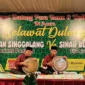 Para peserta selawat dulang saat memperlihatkan kemampuannya di Masjid Baitul Mukmin, Nagari Gurun Panjang Utara. (Foto: Dok. Noy)