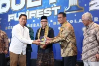 Menteri Pertanian Andi Amran Sulaiman saat menghadiri kegiatan Idul Fitri FunFest 2026 yang diselenggarakan oleh Ikatan Alumni ITS di Jakarta, Sabtu (11/4). (Foto: Kementan)