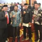 Ketua PKPS Pekanbaru, Irman Sasrianto (dua dari kiri) foto bersama saat menghadiri HJK ke-78 di gedung PCC. (Foto: Dok. Giat)