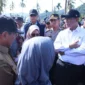 Mentan Andi Amran Sulaiman meninjau lokasi rehabilitasi sawah terdampak bencana di Lubuk Alung, Kecamatan Lubuk Alung, Kabupaten Padang Pariaman, Selasa (14/4/2026). (Foto: Kementan)