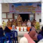 Penyerahan bantuan pangan di halaman Kantor Lurah Tigo Koto Diate, Kecamatan Payakumbuh Utara, Senin (13/4/2026). (Foto: MC Payakumbuh)