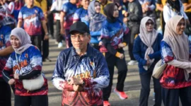 Wakil Wali Kota Padang Maigus Nasir ikut memeriahkan Pulang Basamo Kodaeral II Padang di Mako Kodaeral II Teluk Bayur Padang, Minggu (5/4/2026). (Foto: Prokopim Padang)