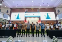 Penandatanganan akad massal KUR 1.000 UMKM, Ekraf dan Bursa Wirausaha Unggulan di Auditorium Widya Sabha Universitas Udayana, Bali, Rabu (13/5/2026). (Foto: Kementerian Ekraf)