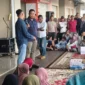 Kepala Disdag Padang, Fizlan Setiawan menggelar pertemuan dan sosialisasi bersama para pedagang di Lantai 3 Fase VII Pasar Raya Padang, Minggu (24/5/2026). (Foto: Diskominfo Padang)