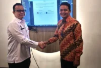 Kepala Diskominfo Kota Padang, Tommy TRD dan Kepala BSrE, Jonathan Gerhard Tarigan usai penandatanganan perpanjangan PKS di Kantor BSrE, Jakarta Selatan, Kamis (21/5/2026). (Foto: Diskominfo Padang)