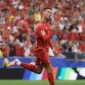 Cristiano Ronaldo melakukan selebrasi usai mencetak gol ke gawang Uzbekistan. (Foto: FIFA.com)