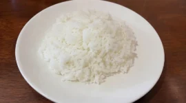 Ilustrasi nasi. (Foto: AI Generate)