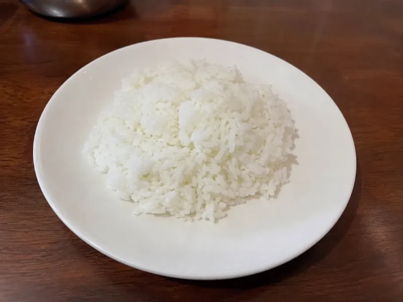 Ilustrasi nasi. (Foto: AI Generate)