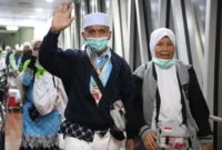 Sebanyak 392 jemaah dan petugas Kloter 05 Debarkasi Padang mendarat dengan selamat di BIM, Senin (8/6/2026) pukul 23.39 WIB. (Foto: Humas Kemenhaj)