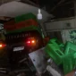 Satu unit mobil jenis Mitsubishi L300 tertimpa longsor di Jalan Padang-Painan KM 16, Kecamatan Bungus Teluk Kabung, Minggu (14/6/2026). (Foto: BPBD Padang) 