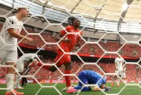 Pemain Timnas Swiss Johan Manzambi usai membobol gawang Kanada dalam pertandingan Grup B Piala Dunia 2026. (Foto: FIFA.com)