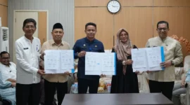 Penandatanganan Kesepakatan Bersama tentang Integrasi dan Pemanfaatan Data dalam Rangka Pengawasan Elektronik (E-Audit Terintegrasi) di lingkungan Pemko Padang, Jumat (5/6/2026) di Kantor Inspektorat Padang. (Foto: Pemko Padang)
