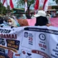 Ratusan relawan yang tergabung dalam Aliansi Relawan MBG Sumbar menggelar aksi damai di depan Gedung DPRD Sumbar, Kamis (25/6/2026). (Foto: Ist)