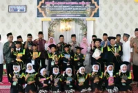 Wakil Wali Kota Padang, Maigus Nasir menghadiri Khatam Al Quran dan Wisuda Tartil ke-5 MDTA Masjid Darul Muslimin Muhammadiyah di Komplek Muslim Village Sang Surya Rimbo Tarok, Minggu (7/6/2026). (Foto: Pemko Padang)