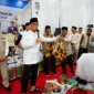 Wamenhaj Dahnil Anzar Simanjuntak saat menyambut kepulangan jemaah haji Kloter 14 Debarkasi Aceh, kelompok terbang terakhir musim haji 1447 H/2026 M, di Asrama Haji Aceh, Selasa (30/6). (Foto: Kemenhaj)