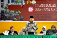 Wakil Wali Kota Padang Maigus Nasir menjadi pemateri pada kegiatan pembekalan mahasiswa KKN-PPM Unes 2026 di Auditorium Unes, Sabtu (18/7/2026). (Foto: Pemko Padang)