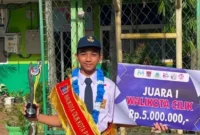 Siswa SMPN 11 Padang Muhammad Alkhalifi Hakim berhasil meraih gelar Wali Kota Cilik Kota Padang 2026. (Foto: Pemko Padang)