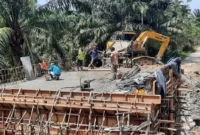 Salah satu pembangunan infrastruktur di Kabupaten Dharmasraya. (Foto: Diskominfo Dharmasraya)