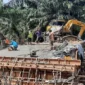 Salah satu pembangunan infrastruktur di Kabupaten Dharmasraya. (Foto: Diskominfo Dharmasraya)