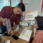 Kasi Kesos Kecamatan Koto Tangah, Wahyudi Edwar pada kegiatan pendaftaran Perlinsos di Kecamatan Koto Tangah, Kamis (30/7/2026). (Foto: Pemko Padang)