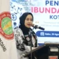 Dian Puspita Fadly Amran resmi menyandang gelar Ibunda Guru PGRI Kota Padang. (Foto: Pemko Padang)
