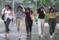 Ilustrasi hujan lebat. (Foto: AI Generated)