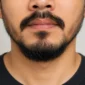 Ilustrasi kumis dan jenggot. (Foto: AI Generate)
